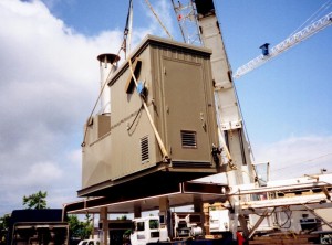 IOL Oxy on site being lifted by a drane